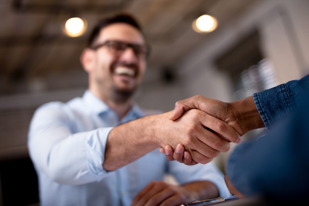 Business,People,Shaking,Hands. mercadoinsuranceagency